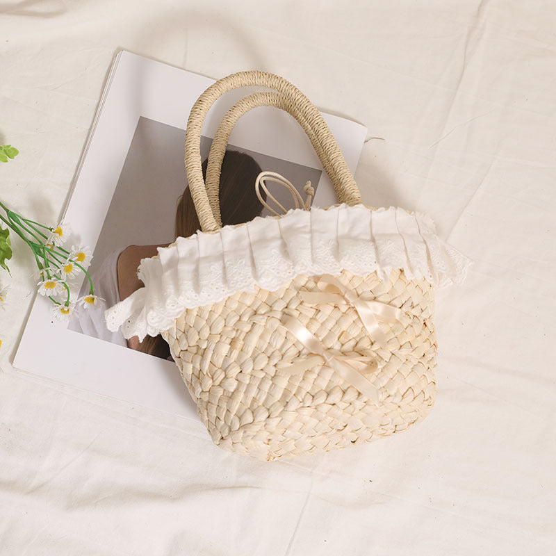 Handcrafted basket bag with delicate ruffles and ribbons Stornfield