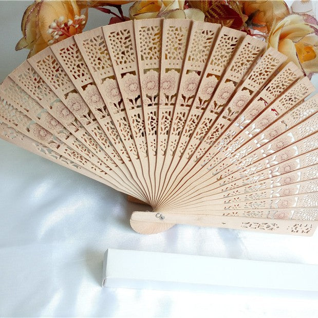 Ladies fan made of delicate plastic with artistic cut pattern Stornfield