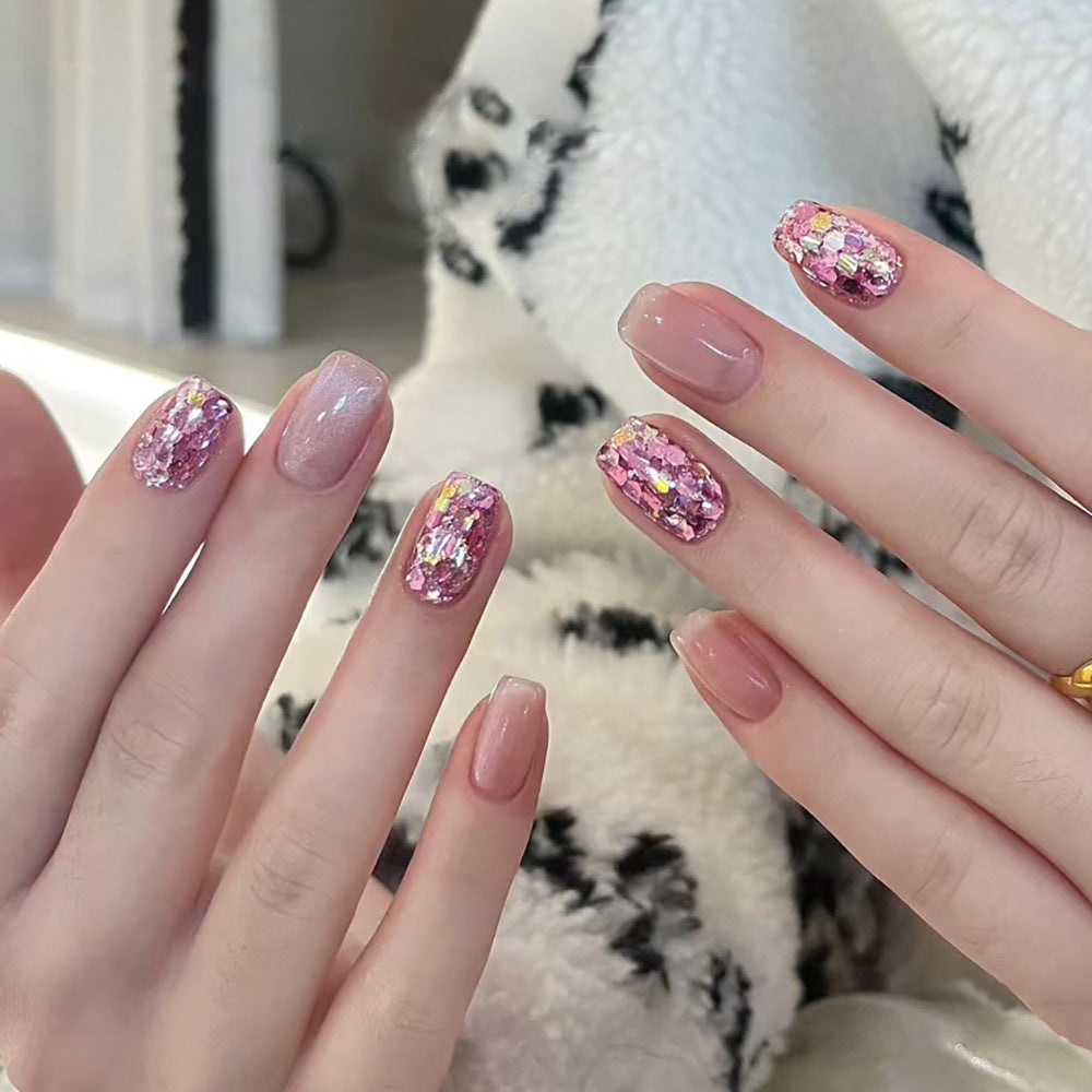 Artificial nail art with glitter and glamour effects Stornfield