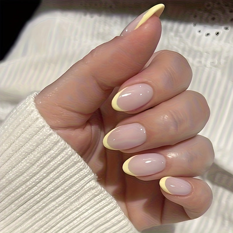 Artificial nail set with elegant French tips and creative accents Stornfield