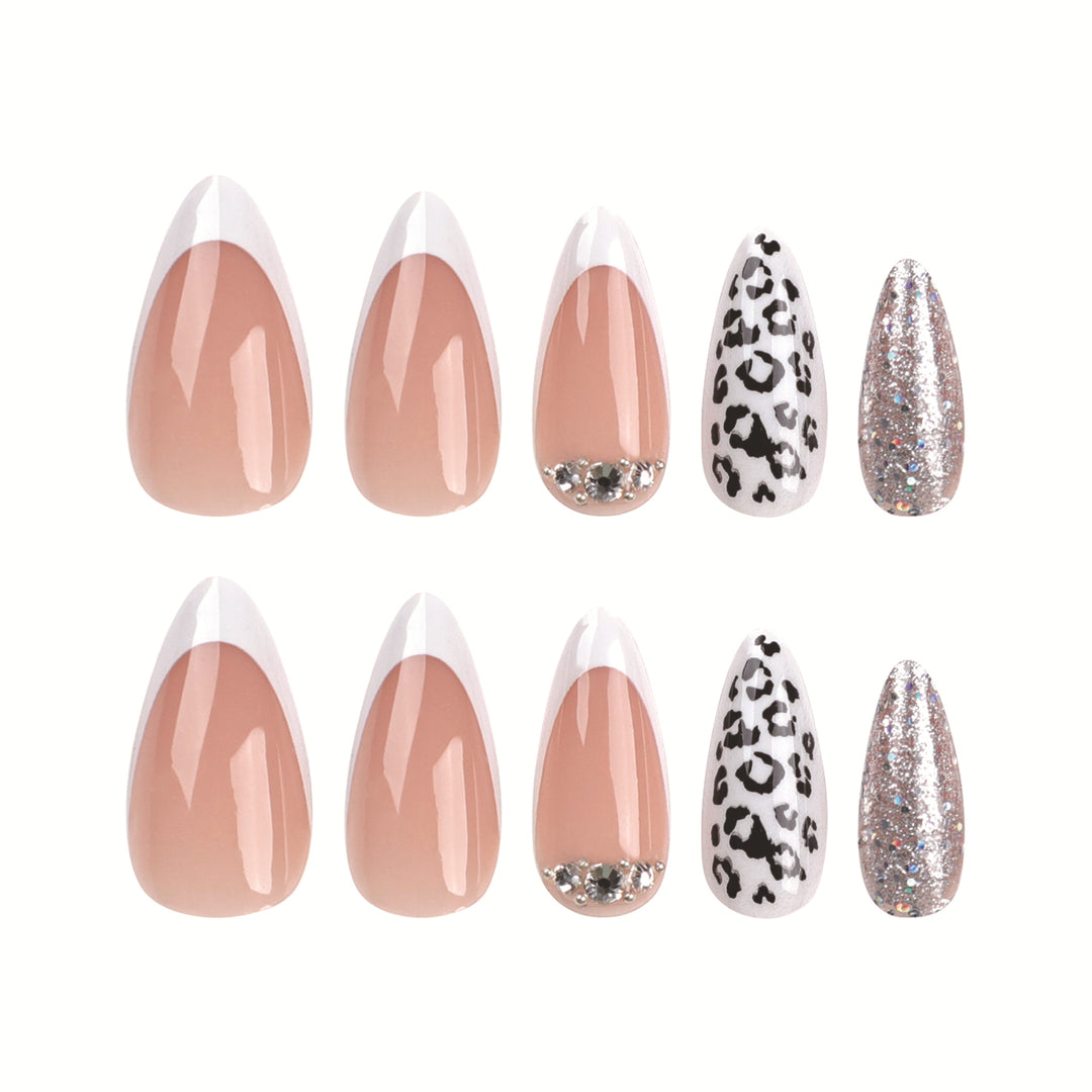 Artful stiletto nails with leopard patterns and glitter accents Stornfield
