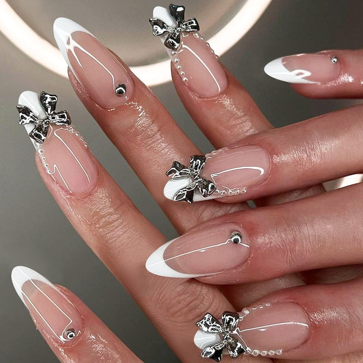 Glamorous artificial nails with sparkling 3D accents Stornfield