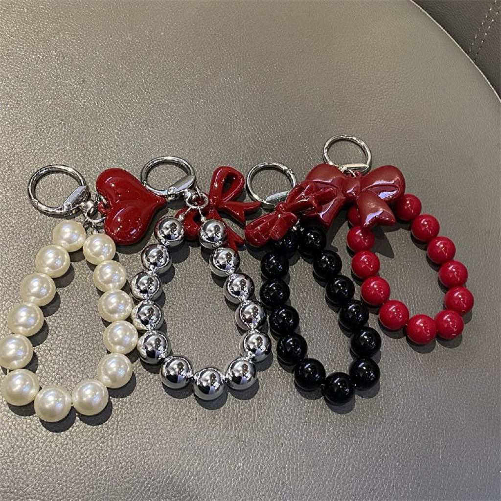 Elegant Pearl Charm Keychain Stornfield