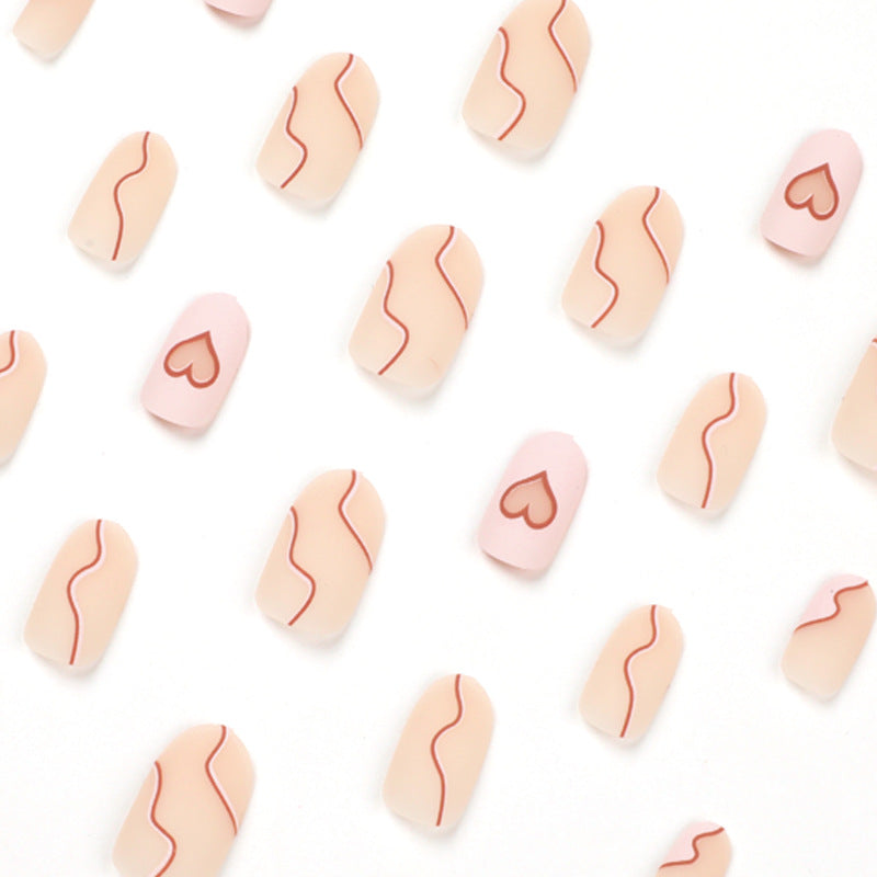 Artful Nail Extensions with Elegant Heart Design Stornfield