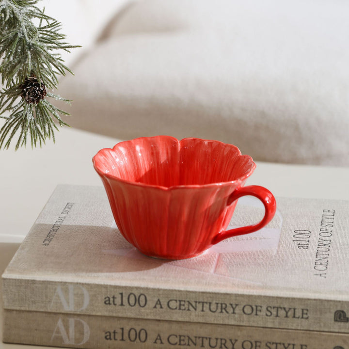 Ceramic mug with saucer in flower shape