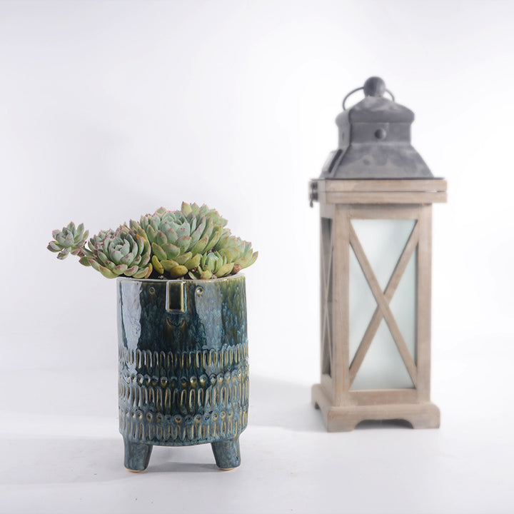 Decorative plant pot with facial features Stornfield