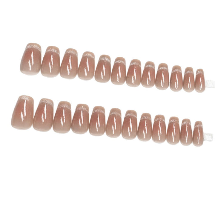 Nail set with elegant French design and sparkling accents Stornfield