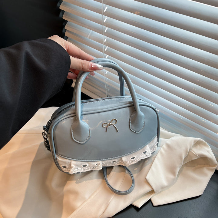 Elegant Bow-Accent Handheld Purse