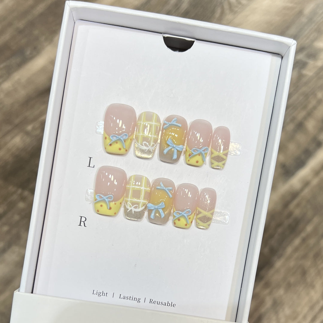 Decorative Press-On Nail Art Set with Charming Bow and Pattern Designs Stornfield