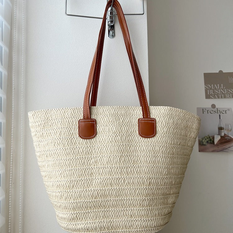 Handcrafted straw bag with elegant leather handles Stornfield