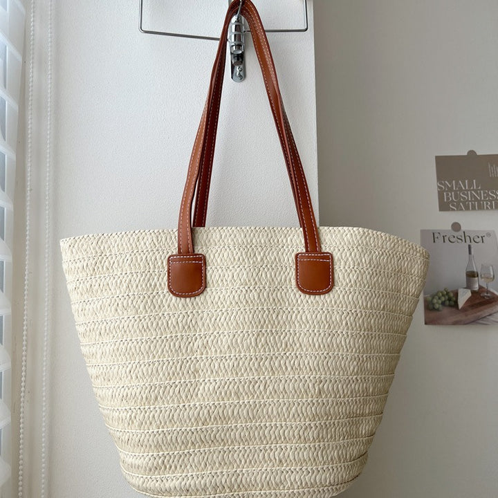 Handcrafted straw bag with elegant leather handles Stornfield
