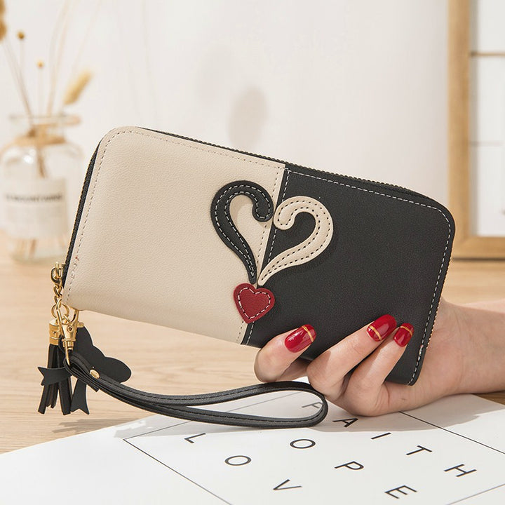 Stylish wallet with heart appliqués Stornfield