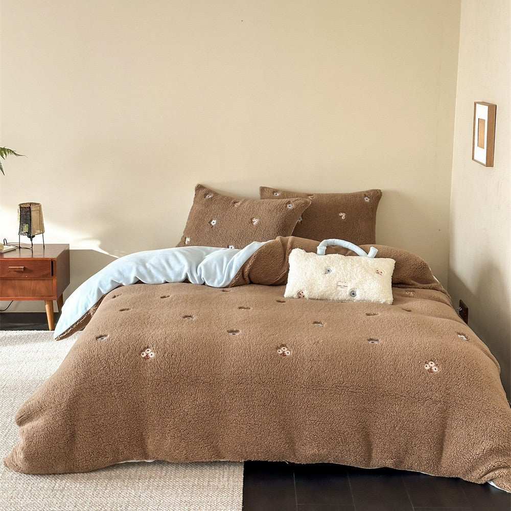 Sherpa bed blanket and reversible bed cover with embroidered flower appliqués