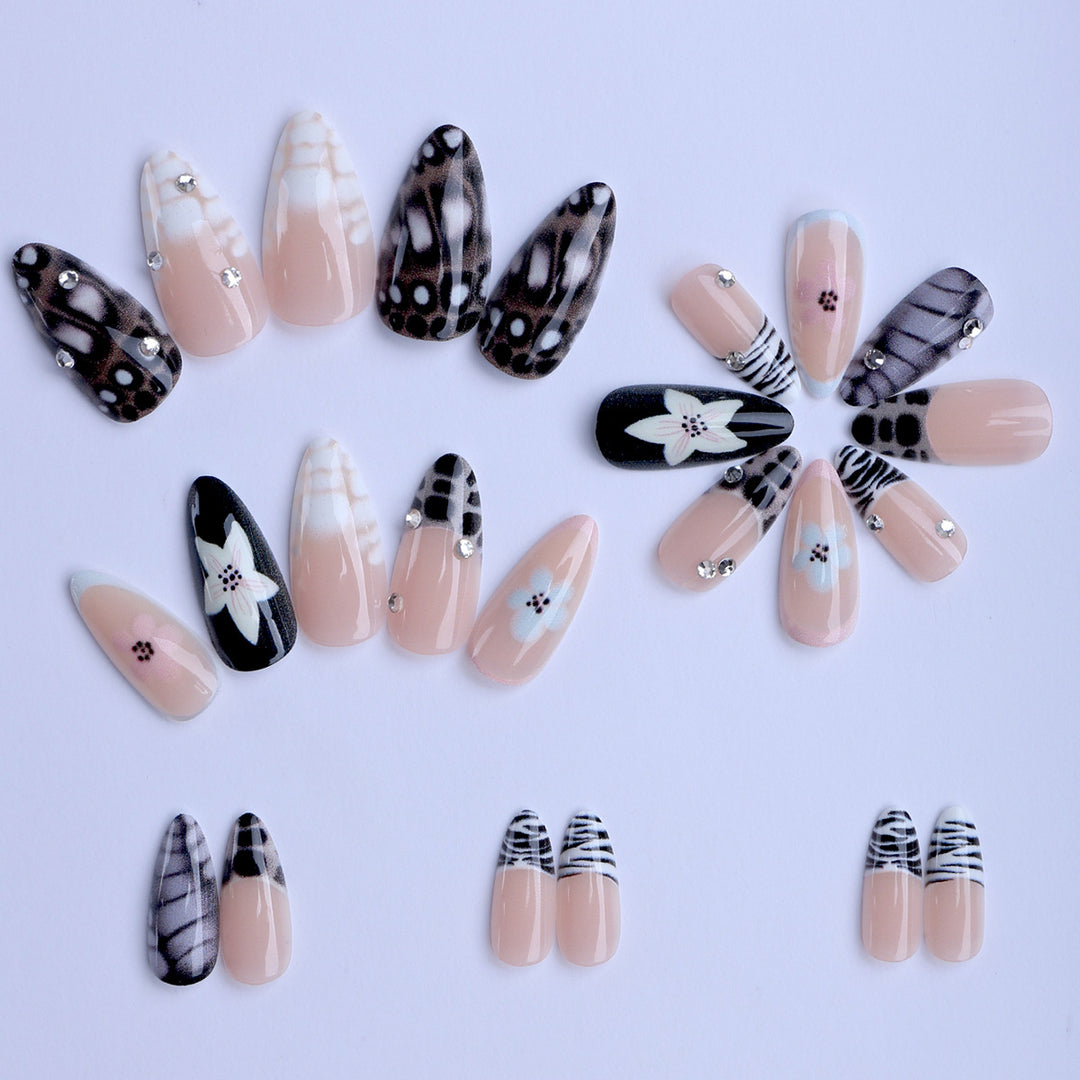 Nail art with elegant designs and embellishments Stornfield