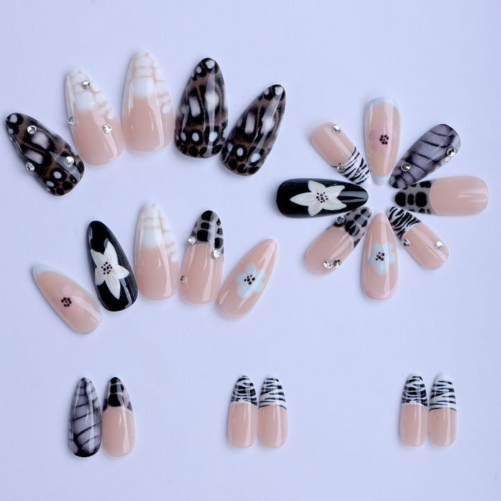 Nail art with elegant designs and embellishments Stornfield