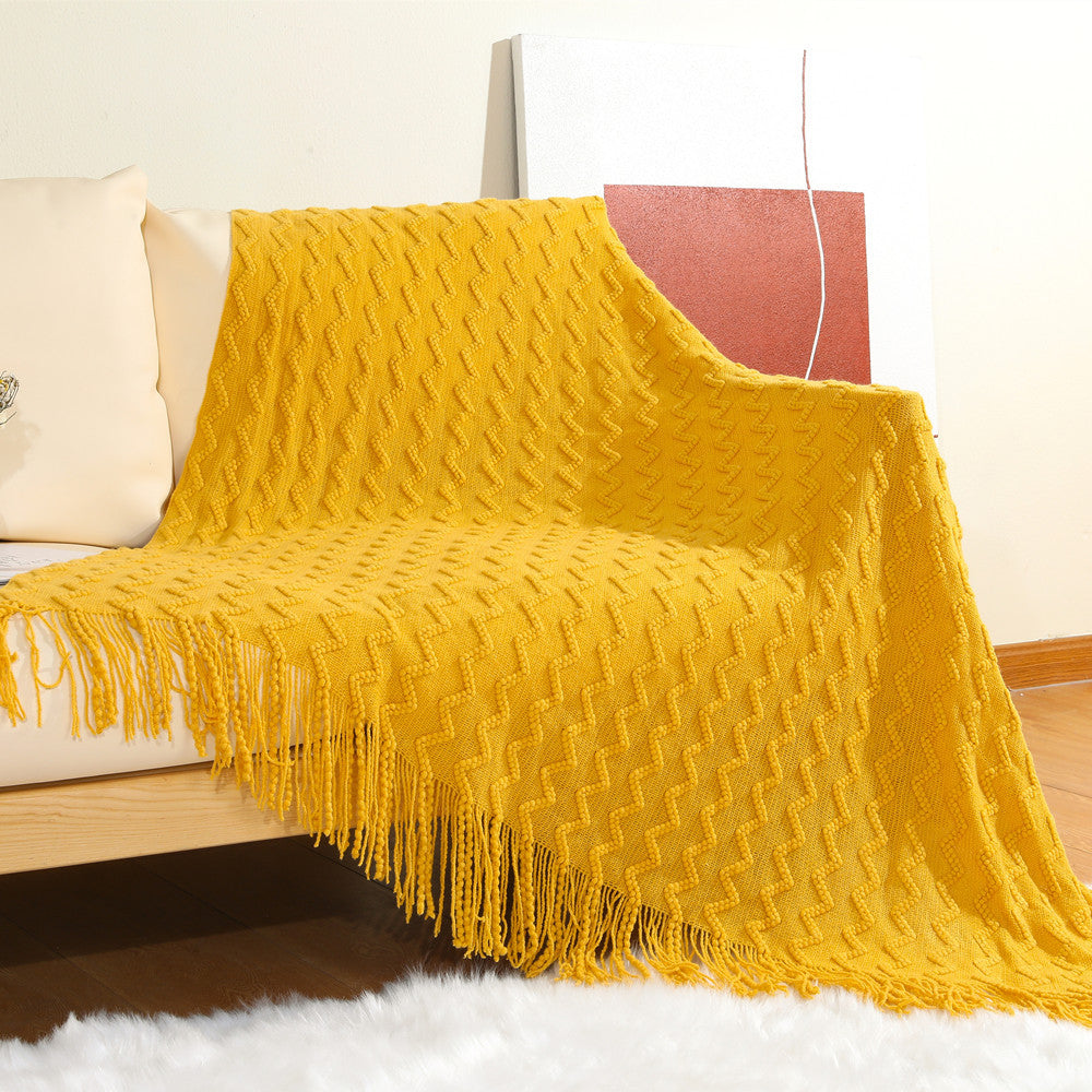 Women’s knitted blanket with textured wave pattern Stornfield