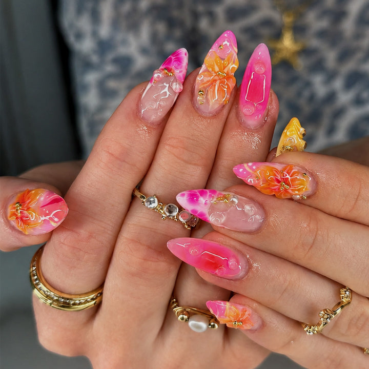 Artificial nail set with floral designs and elegant embellishments Stornfield