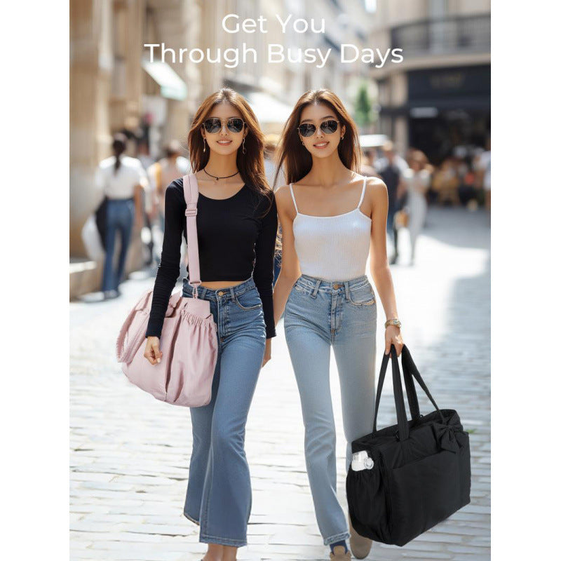 Fashionable tote bag with elegant bow appliqué Stornfield