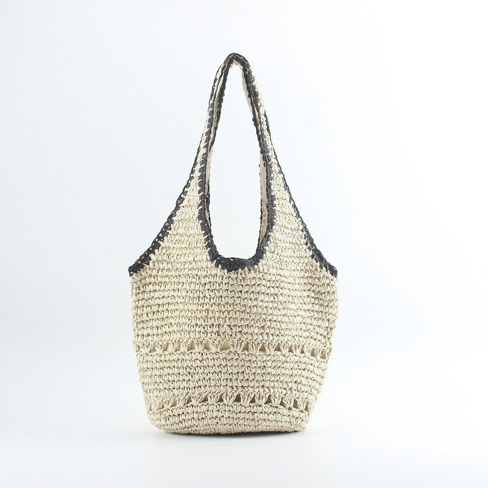 Beach shoulder bag made of hand-woven raffia with elegant lace trims Stornfield