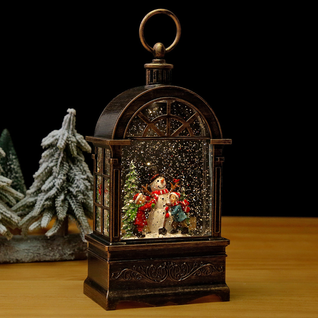 Illuminated Christmas lantern with snow and Christmas motif Stornfield