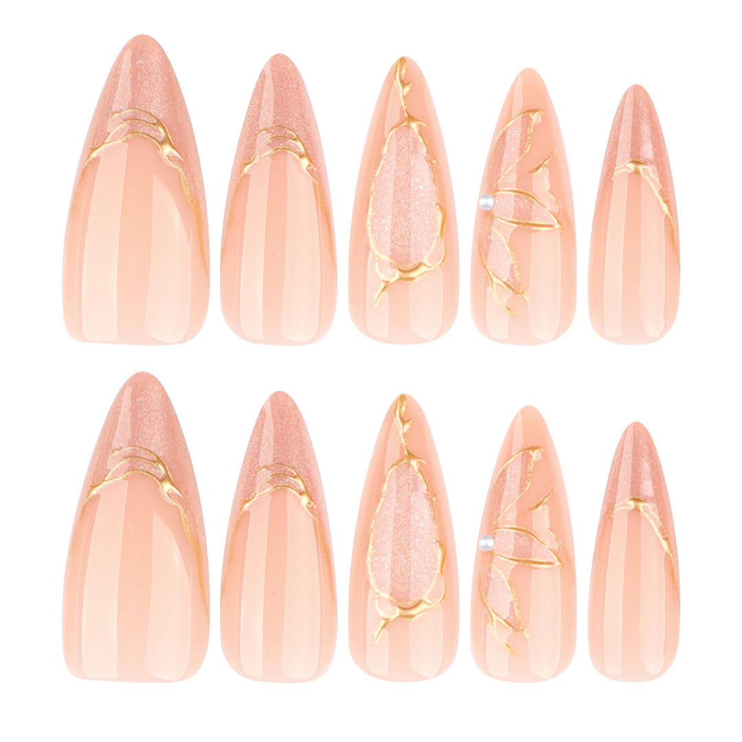 Artful Stiletto Nails with Gold Accents Stornfield