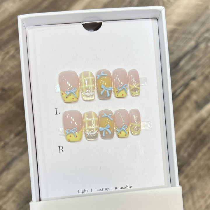 Decorative Press-On Nail Art Set with Charming Bow and Pattern Designs Stornfield