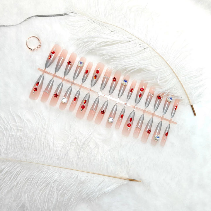 Artificial nails with glamorous design and sparkling accents Stornfield