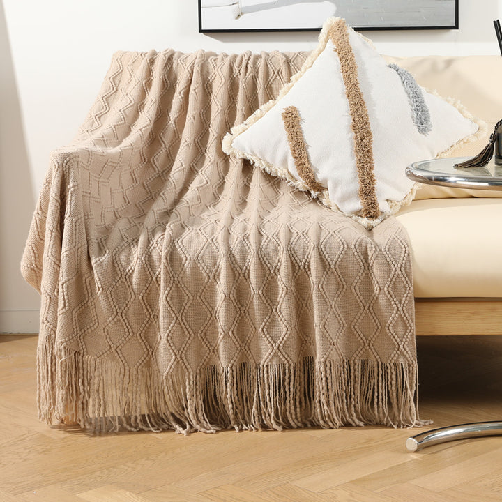 Ladies elegant and cozy knitted blanket with fringes Stornfield