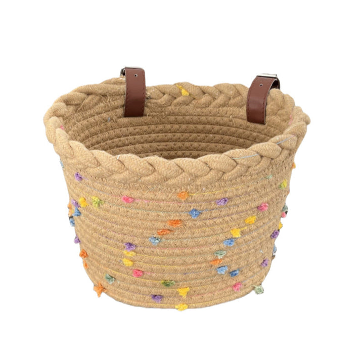 braided rope bike basket with pom pom embellishments and leather handlebar straps Stornfield