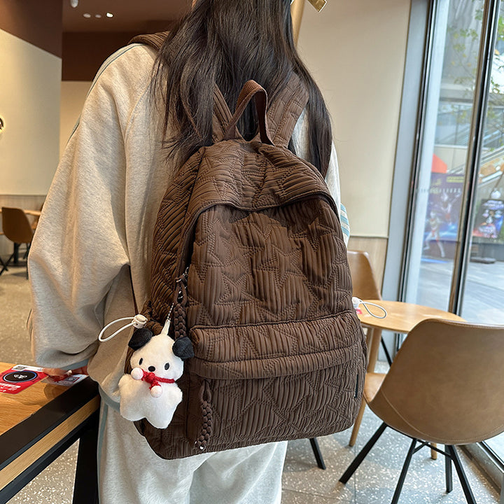 Quilted Backpack with Decorative Charm Stornfield