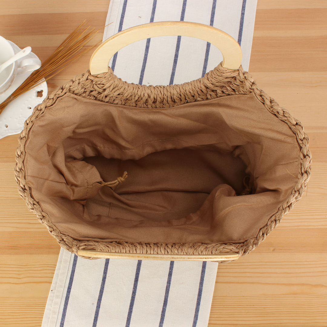 Designer bag made of hand-woven wicker with wooden handle Stornfield