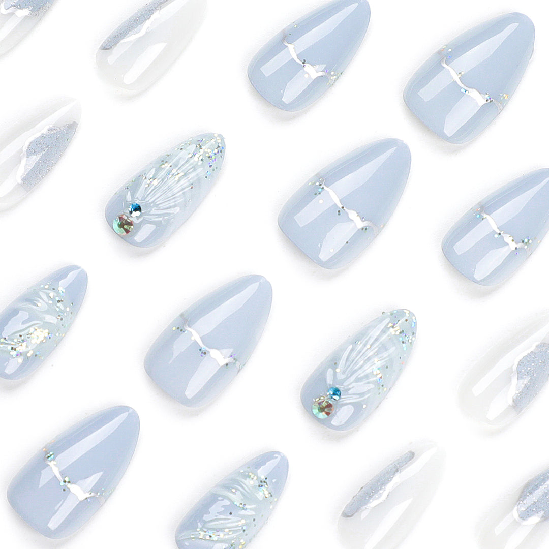 Artful stiletto nails with elegant glitter and floral design Stornfield