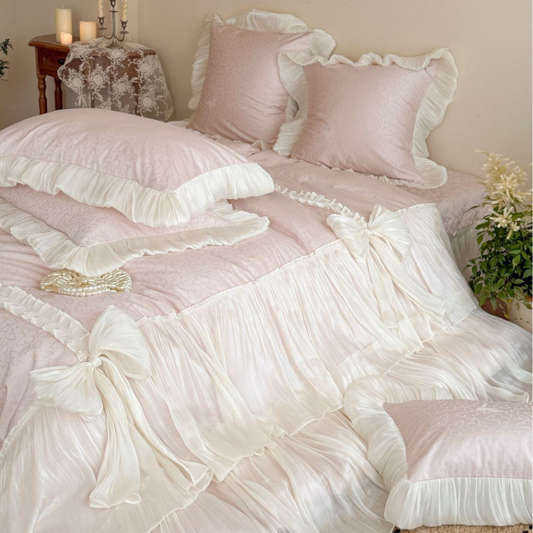 Elegant pleated bed set with gathered bed skirt and decorative pillows