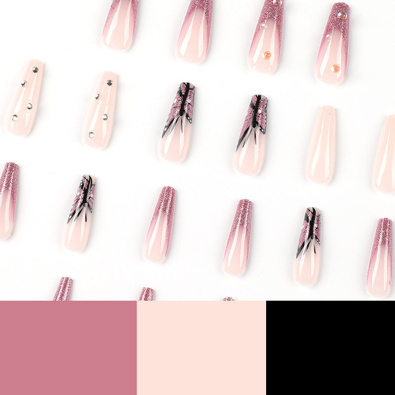Artful stiletto nails with floral and glittering accents Stornfield