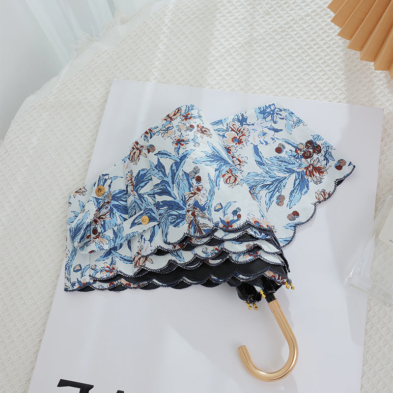 Women's elegant automatic folding umbrella with floral details Stornfield