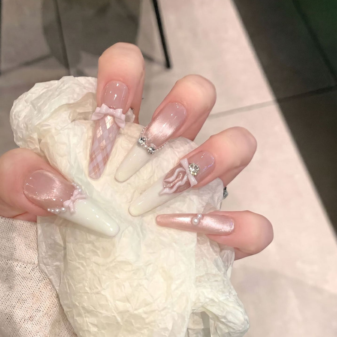 Elegant Stiletto Press-On Nail Set with Decorative Bow and Gem Accents Stornfield