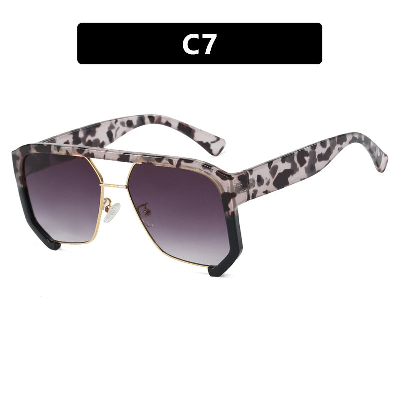 Ladies fashionable oversized sunglasses with elegant, faceted frame construction Stornfield