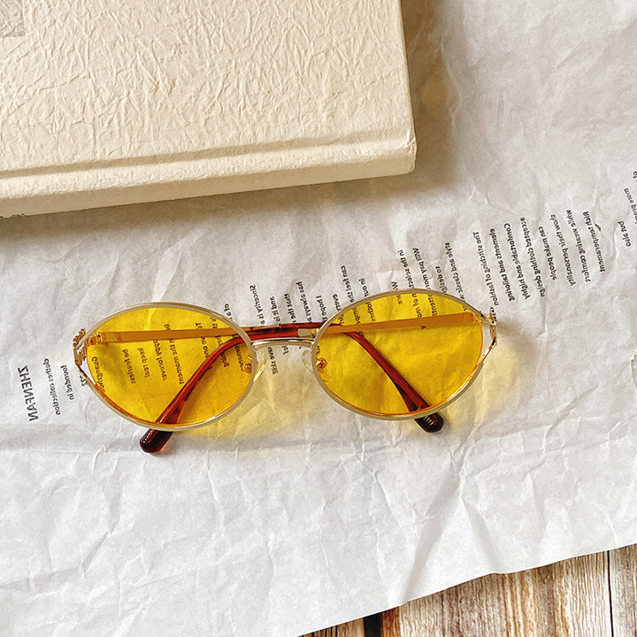 Round Sunglasses with Golden Accents Stornfield