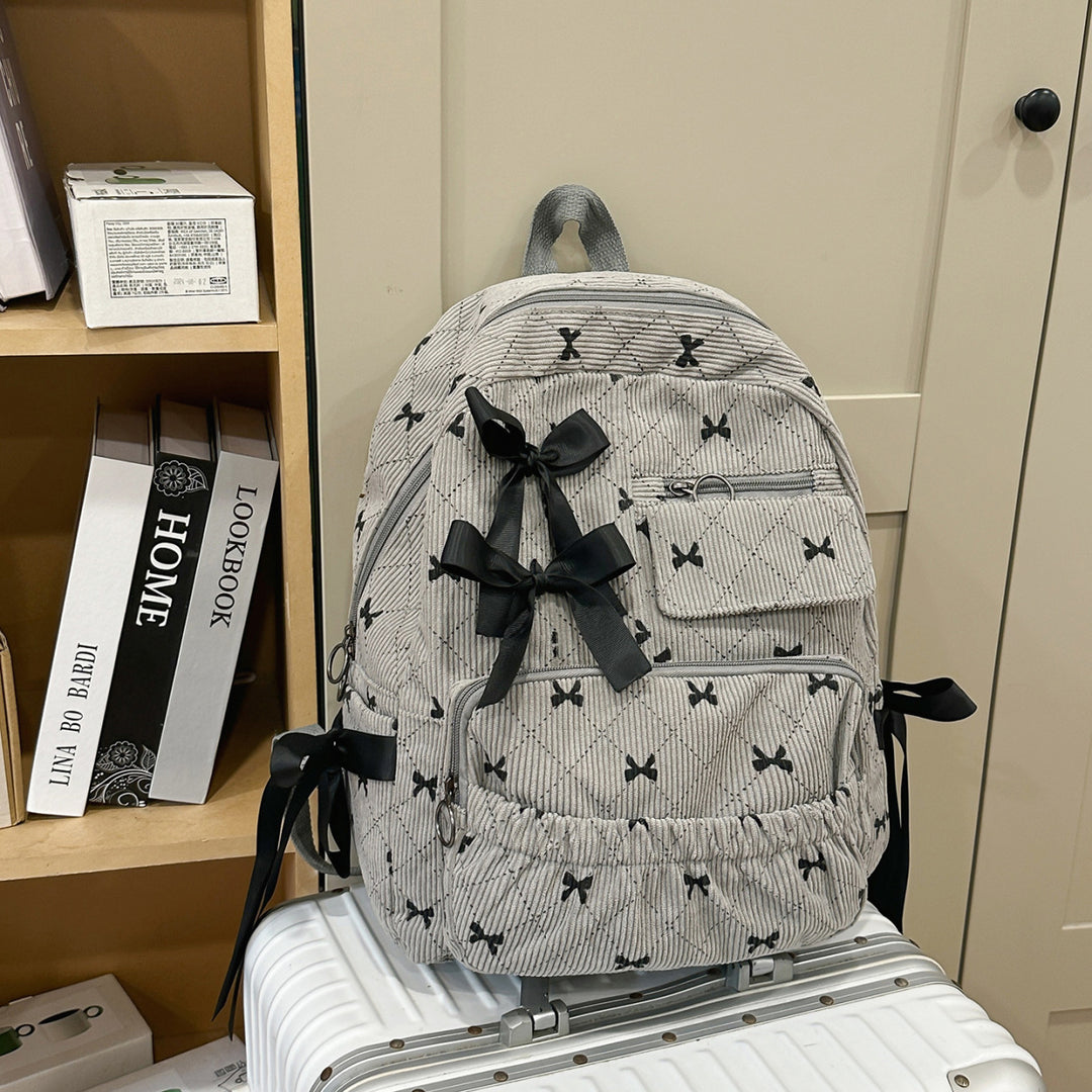 Playful backpack with bow details and practical compartments Stornfield