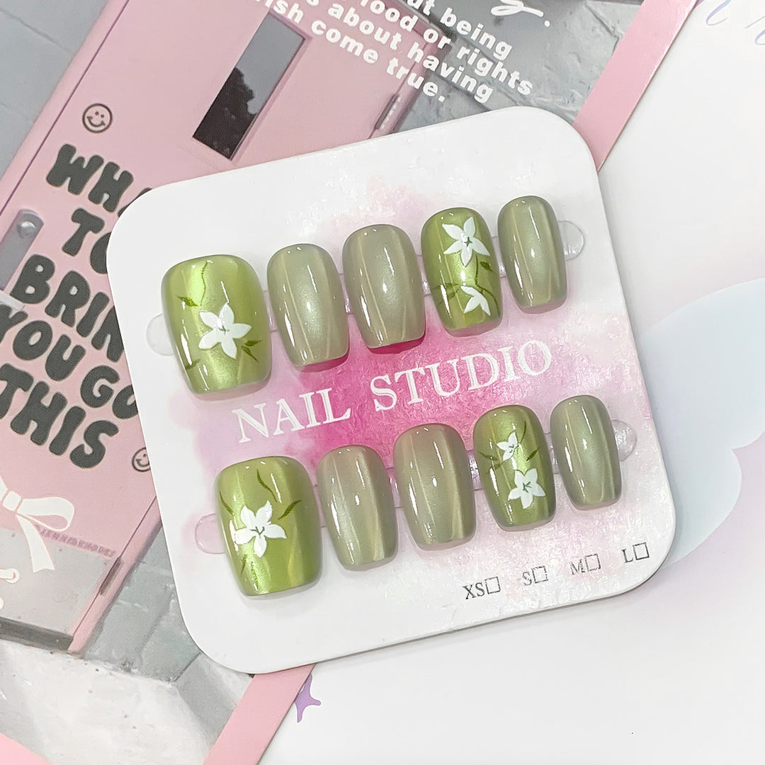 Artistic acrylic nails with floral design Stornfield
