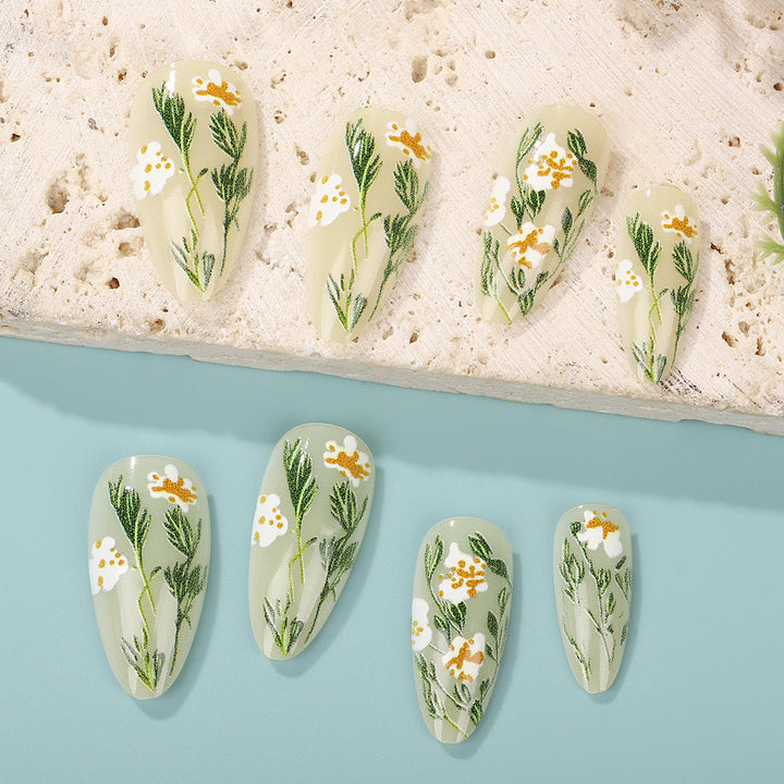 Handmade art nails with floral accents Stornfield