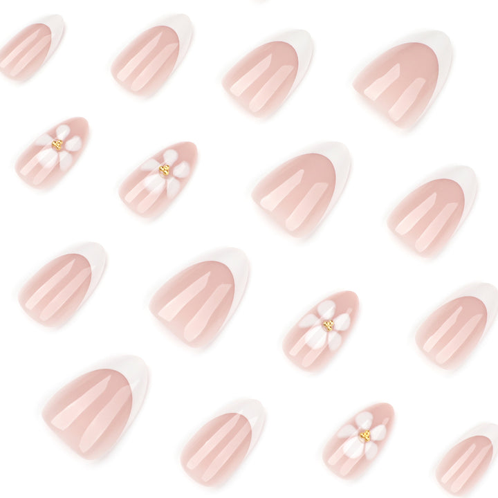 Artful nail extensions with flower design and elegant French tips Stornfield