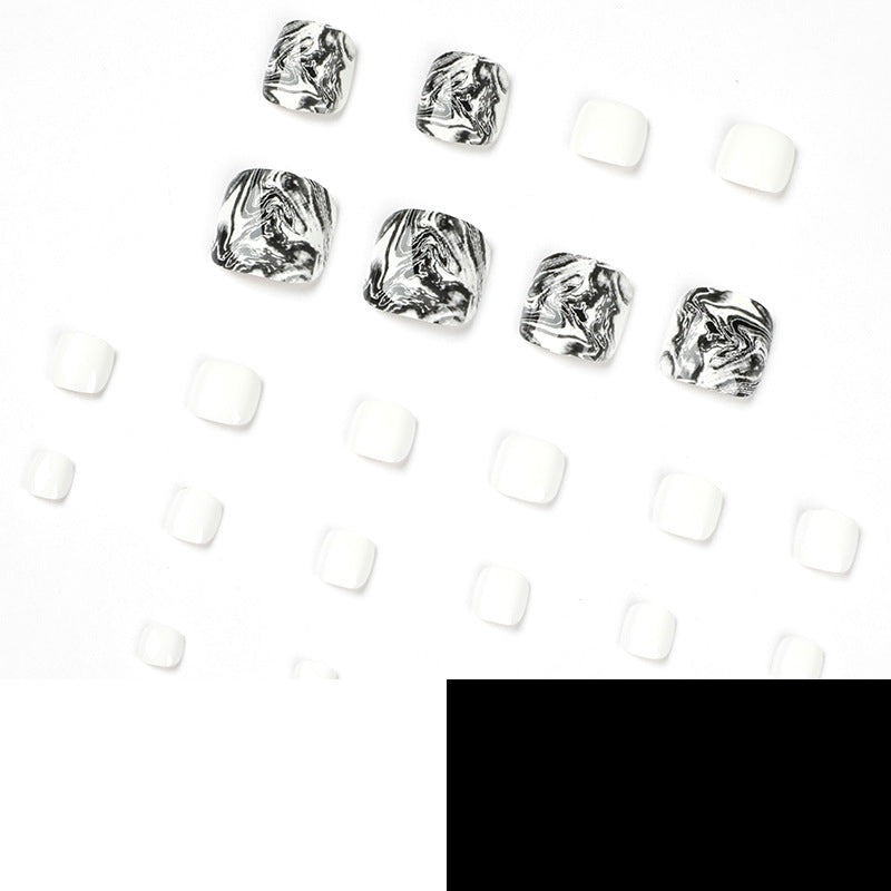 Artful toenail art in elegant marble design Stornfield