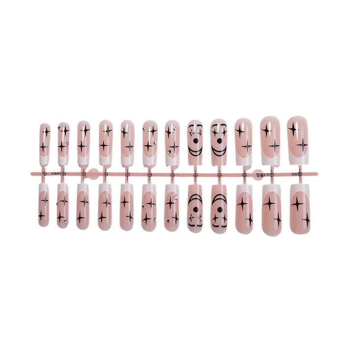 Artistic Press-On Nail Set with Unique Star and Graphic Designs Stornfield