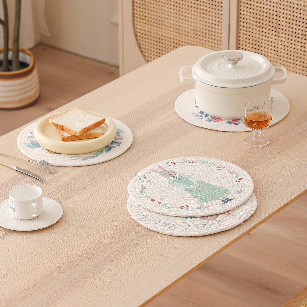 Round quilted table set placemat made of cotton blend with playful rhinoceros print