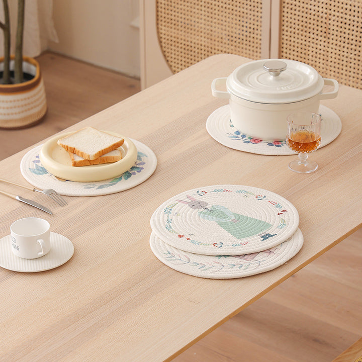 Round quilted table set placemat made of cotton blend with playful rhinoceros print