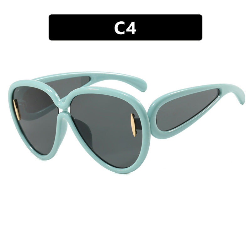 Women extravagant sunglasses in creative design Stornfield