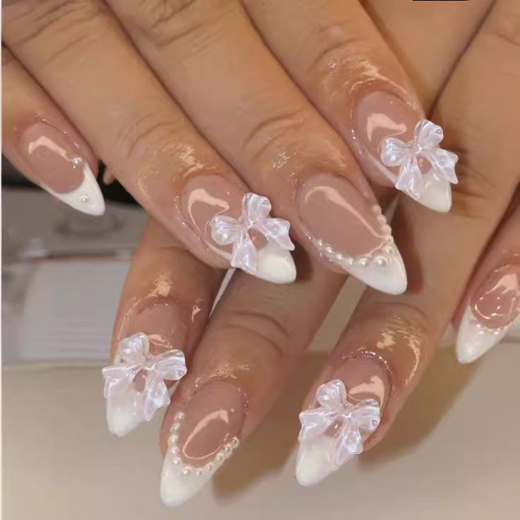 Nail art set with elegant tips and floral accents Stornfield