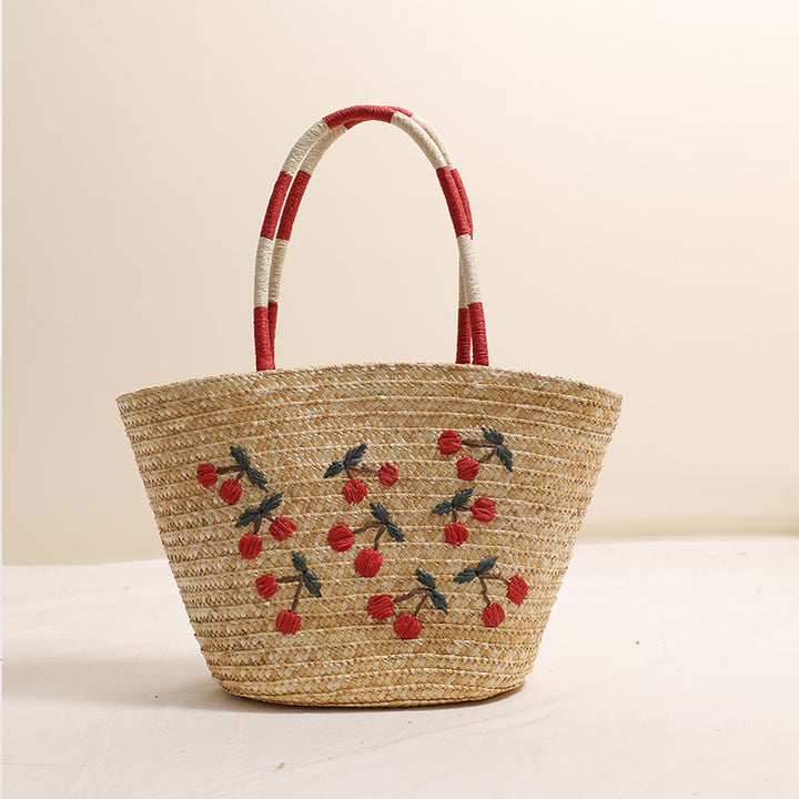 Handcrafted basket bag with vibrant floral embroidery design Stornfield