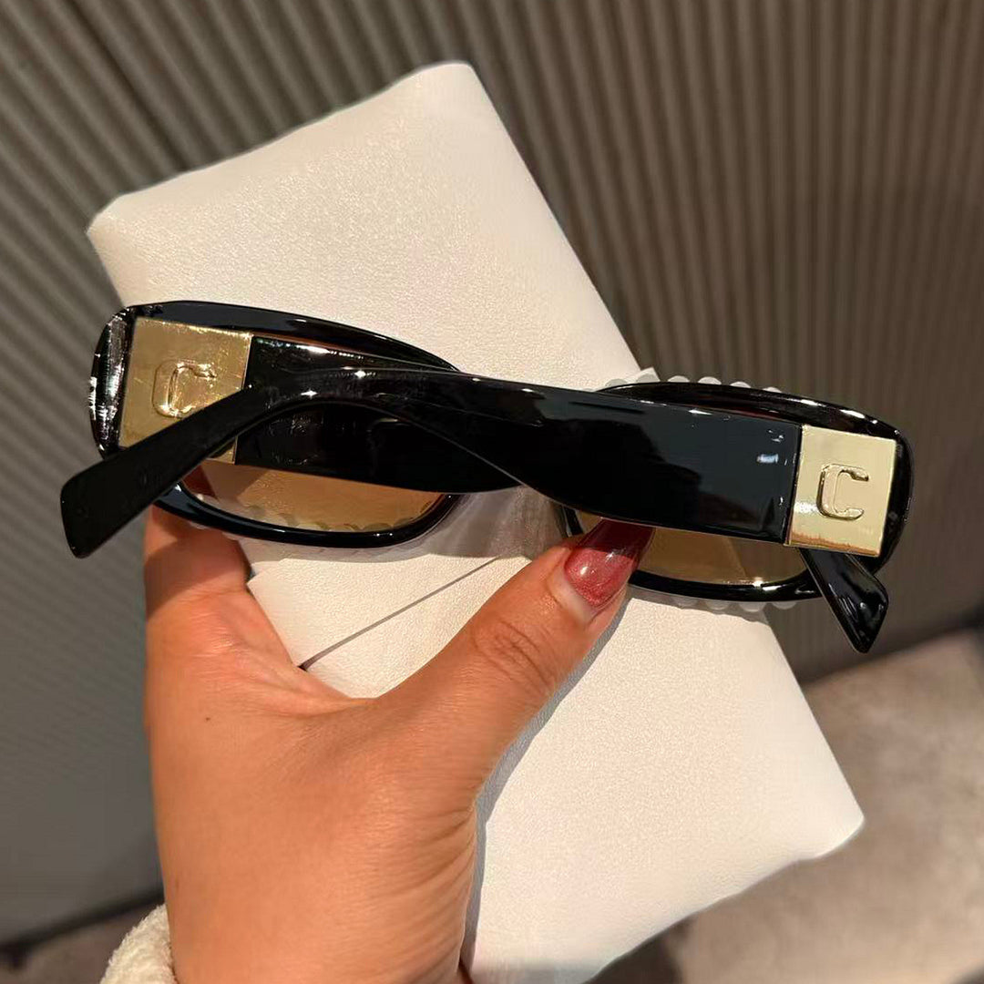 Ladies fashionable sunglasses with luxurious pearl frame Stornfield